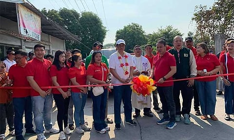 NEW FARM TO MARKET ROAD. 
Department of Agrarian Reform Secretary Conrado Estrella III, Mayor Rene Maglanque and other local officials on Wednesday lead the inauguration of the P97-million Gulap-Sto. Rosario farm-to-market road in Candaba town.