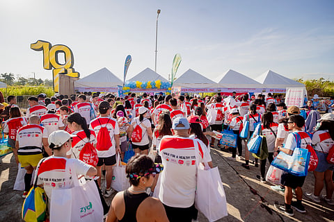 Participants line up for freebies from partners of Mercury Drug Foundation.

