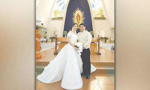 NEWLYWEDS. Julian and Nicole (Ong Oh) Neri at the Sacred Heart Parish.