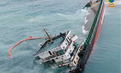 OIL SPILL. Cargo vessel LCT MSCI 1 tilts and partially capsizes near the coastal waters of Barangay La Virgen Milagrosa in Badoc, Ilocos Norte on June 9, 2026. The Department of Agriculture said Thursday (June 11) it has deployed teams to monitor the situation and prepare assistance to affected fishers. (Photo courtesy of Pvt. June Francis Tayactac Facebook)