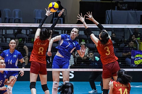 POWER SMASH. Yuliya Fomenko (7) of Kazakhstan delivers a powerful spike against Vietnam during their game in the Asian Volleyball Confederation (AVC) Women’s Cup at Candon City Sports Arena in Ilocos Sur. Kazakhstan won, 18-25, 25-19, 23-25, 25-22, 15-13.  / 