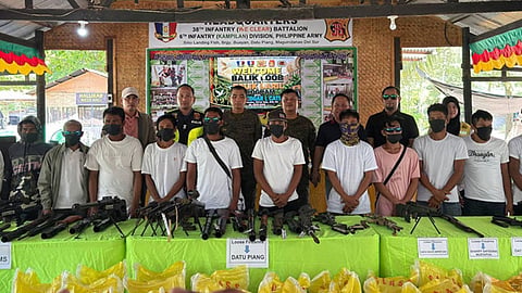 14 violent extremist group members surrender