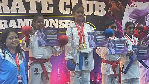 KARATE CHAMPION. Dabawenya Veeya Angel Noro Jayan, center,  stands on the podium during the medal ceremony after winning the Girls Individual Kata (8-9 years old) event at the 2nd International Karate Club Championship 2026 in Selangor, Malaysia. She also won the kumite title in her age group to emerge as the overall champion.