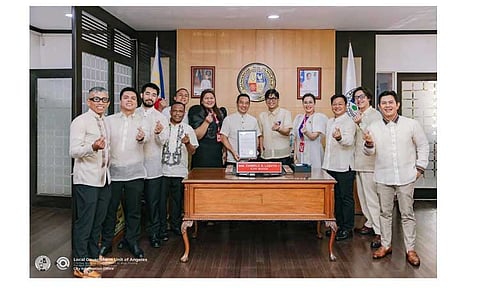 AC council honors Lazatin 
for top performance award