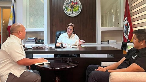 Department of Education (DepEd) Davao regional director Maria Ines C. Asuncion, center, discusses sports development initiatives with DepEd regional sports coordinator Alim Maguindanao, left, and Davao City Sports Development Division of the City Mayor's Office (SDD-CMO) officer-in-charge (OIC) Mikey Aportadera during a meeting at the regional office.