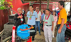 Consul General Hirotaka Ono (center-left) joins local officials and farmers in Santo Tomas during the official turnover of a P3.2 million bamboo processing equipment facility funded through Japan's Grant Assistance for Grassroots Projects (GGP).