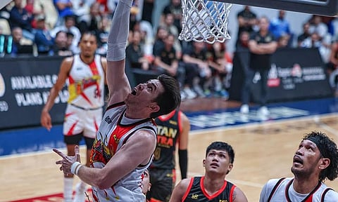 INSIDE POWER. San Miguel Beer’s Rodney Brondial (left) goes up for a shot against Titan Ultra during their PBA Governors’ Cup game at the Ynares Center in Antipolo. Brondial posted a double-double of 13 points and a game-high 17 rebounds as the Beermen rolled to a 144-113 victory.  / 