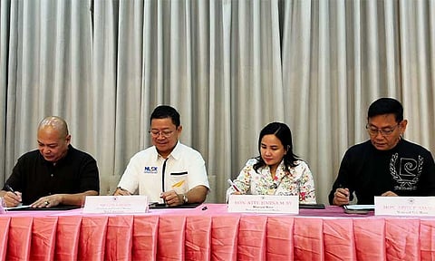 (L-R): NLEX Operations and Maintenance Management Head Denn Charly G. Española, NLEX President and General Manager Luis S. Reñon, Marilao Mayor Atty. Jemina M. Sy, and Vice Mayor Ariel P. Amador sign a Memorandum of Agreement (MOA) establishing the municipality’s Animal Shelter and Care Facility as the turnover site for strays rescued along NLEX.