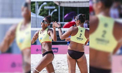 HISTORIC. Philippine beach volleyball players Sofiah Pagara and Khy Progella celebrate after winning a point during the Volleyball World Beach Pro Tour Futures in Busan, South Korea. Pagara and Progella completed an unbeaten run to win the women’s title, while fellow Filipinas Sisi Rondina and Bernadeth Pons finished runners-up in an all-Filipino final on Sunday. 
