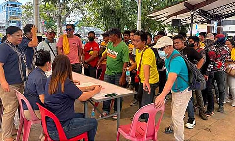 Displaced employees of the raided Davao Mighty Steel plant gather at the Davao City Hall grounds on August 17, 2026, to appeal for local government assistance. The workers sought immediate livelihood and daily subsistence aid after a sudden National Bureau of Investigation (NBI) shutdown on August 14 left hundreds without employment.