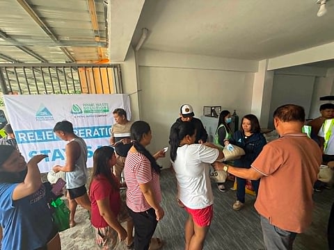 Habagat-hit families benefit
from waste firm's relief ops