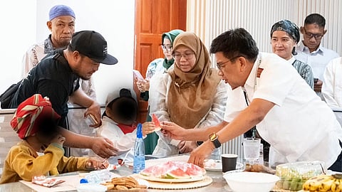 ZAMBOANGA. Basilan Governor Mujiv Hataman (right) hands over a watermelon fruit to a learner of the Sta. Clara Special Needs Education (SNED) Center during their visit to the People’s Capitol on Monday, August 24, 2026. (SunStar Zamboanga) 
