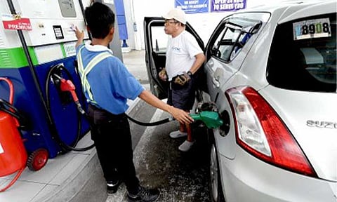 HIKE. A fuel firm attendant caters to a customer in this undated photo. Fuel prices are projected to rise by as much as PHP2.25 per liter next week given the same path in the international market. (PNA file photo) 