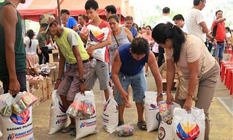 RICE DISTRIBUTION. Residents of Dagupan City, Pangasinan receive 10 kilos of rice each during a distribution at the city plaza on May 7, 2026. Palace Press Officer Claire Castro said Wednesday (Aug. 26) that the national government will continue to monitor the utilization of the Local Government Support Fund. (Photo courtesy of Mayor Belen Fernandez FB)