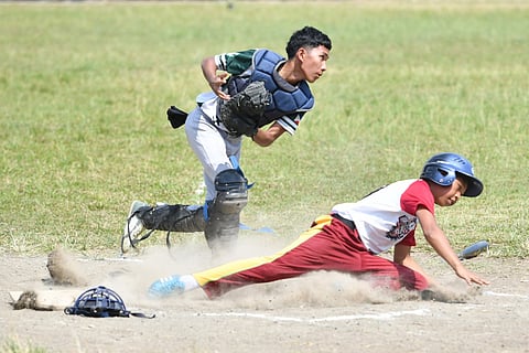Student-athletes compete in a baseball game as part of Davao City’s sports development programs. 