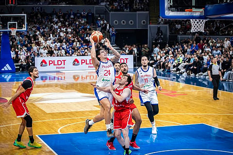 GILAS IN CONTROL. Dwight Ramos (24) drives past Iran defenders as Kai Sotto (11) follows during the Philippines’ 68-56 win over Iran in the FIBA Basketball World Cup 2027 Asian Qualifiers.