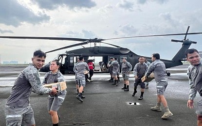 HELP. Philippine Air Force (PAF) and Department of Social Welfare and Development personnel work hand-in-hand to load family food packs into an S-70i "Black Hawk" helicopter at Clark Air Base, Mabalacat City, Pampanga on Tuesday (Sept. 1, 2026), bound for San Marcelino, Zambales. The Office of Civil Defense on Wednesday (Sept. 2) said individuals affected by the combined effects of tropical cyclones and the ongoing southwest monsoon or "habagat" have reached 9.4 million. (Photo courtesy of the PAF)