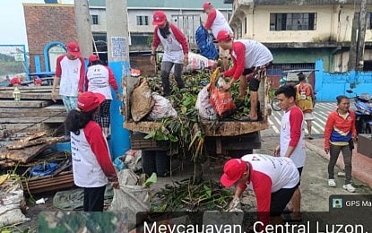 EMERGENCY EMPLOYMENT. TUPAD beneficiaries in Meycauayan, Bulacan assist in clearing operations in the aftermath of heavy rains in this undated photo. The Department of Labor and Employment (DOLE) said Wednesday (Sept. 2, 2026) it is providing PHP386.6 million in livelihood and emergency employment assistance to 49,879 workers in Central Luzon who were affected by the enhanced southwest monsoon or "habagat". (Photo courtesy of DOLE Central Luzon)
