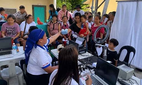 Philippine Statistics Authority (PSA) registration personnel process applications during the Child Labor Prevention and Elimination Program (CLPEP) Information and Service Caravan at the JAS Central Elementary School in Jose Abad Santos, Davao Occidental on August 20. Coordinated by the Department of Labor and Employment (DOLE)-Davao Region alongside the local government unit under Mayor Jason John A. Joyce, the convergence brought dynamic inter-agency services—including civil registration, health profiling, and social assistance—closer to 150 local children and parents, particularly families affected by a recent magnitude 7.8 earthquake.