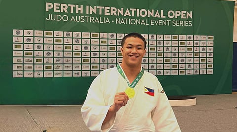 GOLDEN MOMENT. Davao judoka Chino Sy Tancontian displays his gold medal after winning the men’s -100-kilogram division at the 2026 Perth International Open in Australia on Sept. 12, 2026. Tancontian swept both of his matches by ippon as he builds momentum for his Asian Games debut in Japan. 
