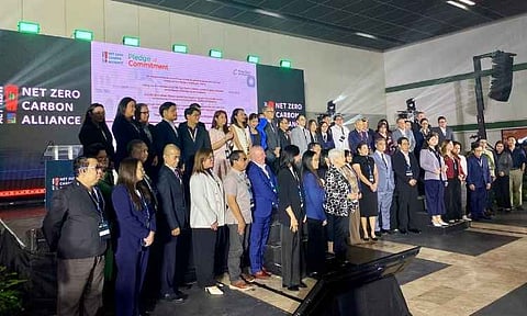 Representatives of companies and partner organizations under the Net Zero Carbon Alliance (NZCA) gather during the Philippine Net Zero Conference 2026 at the Philippine Trade Training Center in Pasay City, where 50 firms pledged to pursue net-zero emissions by 2050, highlighting private sector efforts to advance a low-carbon and energy-resilient economy.