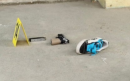 STRONGER MEASURES. The Glock 9mm pistol used in the campus shooting in Banga National High School in South Cotabato and the shoe owned by the alleged shooter right in front of the classroom where the shooting occurred on Friday (Sept. 18, 2026). Senator Risa Hontiveros on Monday (Sept. 21) said the latest campus attack adds urgency to a Senate proposal giving law enforcers stronger tools to investigate online grooming and recruitment into violence. (Photo courtesy of DXOM-AM)