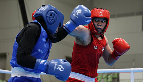 Nesthy Petecio of the Philippines throws a punch against Jordan’s Mays Alreem Abukhadijah during their women’s 60-kilogram boxing bout at the Aichi-Nagoya Asian Games on Saturday, Sept. 26, 2026, in Nishio, Japan. Petecio won by referee-stopped contest in the second round.