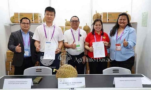 DURIAN DEAL IN CHINA: Representatives of Raspina Tropical Fruits Inc. and Zhongshou Zhongxin (Guangxi) Import and Export Trading Ltd. sign a sales contract for 14 metric tons of fresh Philippine durian during the 23rd China-ASEAN Expo on Sept. 20, 2026, in Nanning, Guangxi, China. The deal opens another market opportunity for Davao Region durian exporters in China.