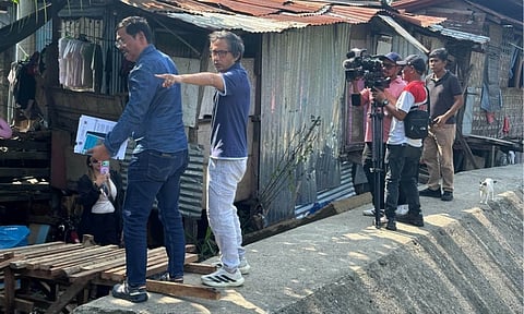 Department of Public Works and Highways (DPWH) Secretary Vince Dizon inspects flood-impacted residential zones and narrow waterways along a riverbank in Bangkal, Davao City. Dizon toured the affected communities to assess structural damage and coordinate immediate rehabilitation efforts following severe local flooding.