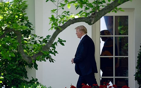 USA. President Donald Trump walks out of the Oval Office and toward Marine One on the South Lawn of the White House in Washington, Tuesday, May 15, 2018, as he heads to Walter Reed National Medical Center to visit with first lady Melania Trump who is recovering from a kidney procedure. (AP)