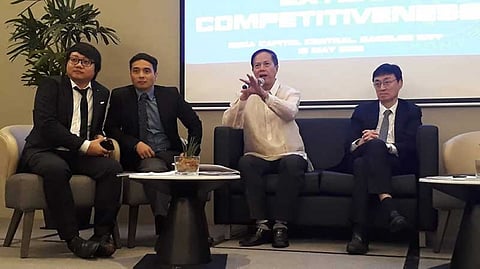 BSP Department of Economics Research Acting Deputy Director Dr. Joselito Basilio (2nd from left) with other speakers during the Conference on Gearing Up for External Competitiveness at Seda Capitol Central in Bacolod City, Tuesday, May 15. (Erwin P. Nicavera Photo)