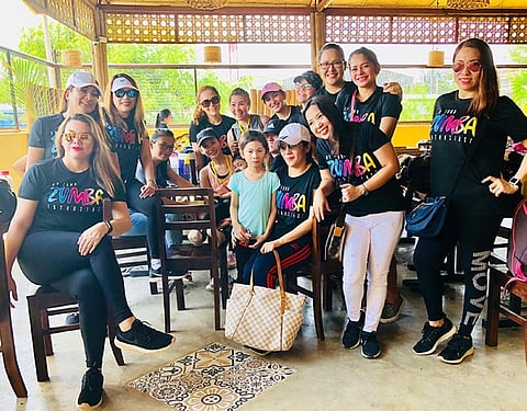 CAGAYAN DE ORO. Our Zumba family by the athletes' area, where we found Audrey applying ice on her thighs. (Hannah Victoria Wabe)