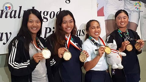 HEROES' WELCOME. The golden girls from left, Lois Go, Bianca Pagdanganan, Hidilyn Diaz and Yuka Saso pose after arriving to a heroes' welcome at the Ninoy Aquino International Airport Tuesday evening, August 28. (PSC)