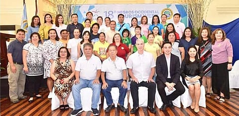 Negros Occidental officials led by Governor Alfredo Marañon Jr. (seated, 3rd from left) and Vice Governor Eugenio Jose Lacson (seated, 3rd from right) with Provincial Supervising Tourism Operations Officer Cristine Mansinares (seated right), tourism officers, private sector partners and DOT-Western Visayas representatives during the Food Parade at Provincial Capitol's Social Hall in Bacolod City Monday, September 17. (Contributed Photo)