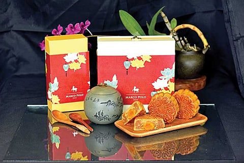 MOON CAKES. Marco Polo Davao offers a selection of unique mooncake gift boxes each containing delectable and traditional mooncakes -- Single Yolk (Red Bean Paste), Single Yolk (Lotus Cream), and Mixed Nuts (Lotus Cream) -- which are available in box of two for P1,200 and box of four for P1,800. (Marco Polo Davao)
