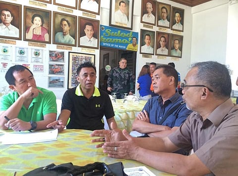 VICTORIAS. Victorias Mayor Francis Frederick Palanca, city housing officer Primilo Solinap, NHA officer Alejandro Ongsuco. (Contributed Photo)