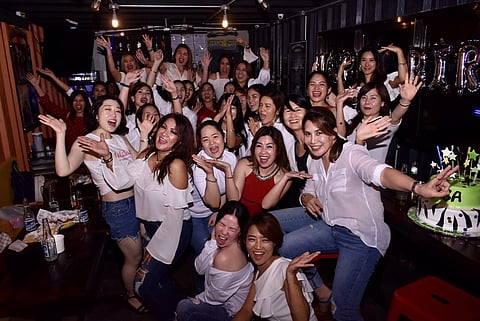 CAGAYAN DE ORO. Party rockin' in the house tonight. Scorpio ladies in red, while the guests are in white. (Hannah Wabe)