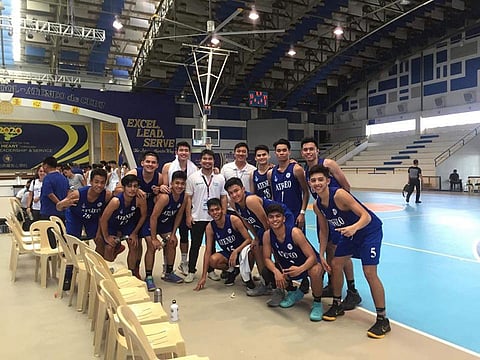 CEBU. The Ateneo de Davao University (Addu) Blue Knights celebrates its first win over Xavier University (XU) Cagayan de Oro City 87-53 in the Jesuit Athletic Meet (JAM) 2018 Junior Boys basketball tournament held at Sacred Heart Cebu (SHS) Friday, October 26. (Ryan Sipe photo)
