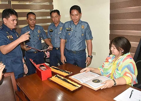 PAMPANGA. The four Kapampangan Swat members who represented the Philippines in the Sharp-Blade 2018 International Sniping Competition, along with Supt. Mike Masangkay present their prizes to Governor Lilia Pineda on Monday at the Capitol. (Contributed Photo)