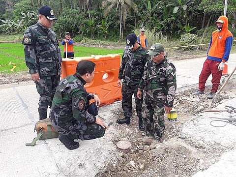SURIGAO DEL SUR. The Explosive Ordnance Division team recovered an improvised explosive device in a national highway of Marihatag, Surigao del Sur. (Contributed photo)