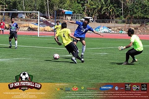 DAVAO. Two players struggle for possession during the UP Mindanao Mens Football Cup Round 1 9-A-Side Football Cup held at the Davao City-UP Sports Complex Stadium over the weekend. (UP Mindanao Photo)
