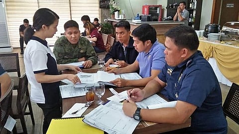 PAMPANGA. Members of the Regional Selection Committee review the documents submitted by 81 local Disaster Risk Reduction and Management (DRRM) Councils, hospitals, schools and individuals vying for the 21st Gawad KALASAG Regional Awards during the desk evaluation held recently at Orchid Gardens Resort Complex, City of San Fernando, Pampanga. (Contributed Photo)