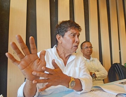 CEBU. Businessman Ruben Feliciano, who is running for town mayor of San Fernando, denied allegations that he orchestrated the shooting incident that occurred in Barangay Bugho last Thursday. He, however, admits that the four men arrested by military personnel were supporters of his. Behind Feliciano is his legal counsel, lawyer Vincent Isles. (SunStar photo/ Alan Tangcawan)
