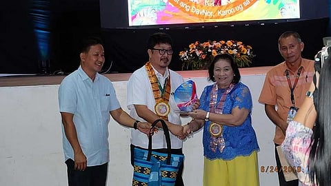 Department of Agriculture (DA)-Davao Region OIC-director Engr. Ricardo Oñate, Jr. (2nd from left) receives a token of appreciation from the provincial government. (Contributed photo)