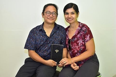 Author Renato Clarete Tranquilino with his wife Eleanor Marie Bahrami-Hessari. (Macky Lim)