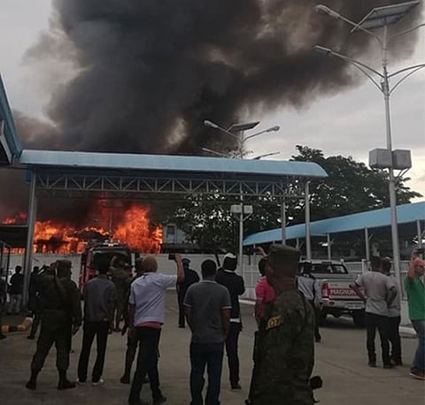 CAGAYAN DE ORO. The inauguration of the new passenger port terminal in Cagayan de Oro City past 3 p.m. Monday, July 15, 2019, was interrupted as fire erupts in nearby residential lot of Piaping Puti, Barangay Macabalan. (PJ Orias)