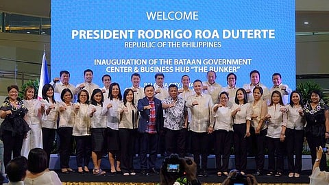 BATAAN. Representatives of National Government Agencies join President Duterte in flashing the 'fist' sign during the recent inauguration of the new Bataan Government Center and Business Hub or "The Bunker", one of the few success stories of PPP in the country. (Photo by Mar Jay Delas Alas/PIA-Central Luzon)