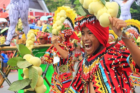 CAMIGUIN. With smiles, colorful costumes and vibrant energy, the locals dance to celebrate the bounty of Camiguin's sweet and juicy fruit, lanzones. Eight contingents compete in this year's Street Dance Competition of Lanzones Festival on Saturday, October 26, in Camiguin. 
