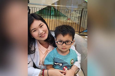 DAVAO. Dr. Lareen Dawn Tan and one of his pediatric patients. (Photo from Global Eyecare Center)