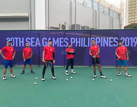 Mark Anthony Alcoseba of Davao City (second from left) joins his national men's soft tennis teammates in a photo before the 30th Southeast Asian (SEA) Games opened on November 30. (Photo from Soft Tennis Pilipinas Facebook)